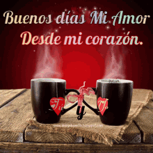 a couple of coffee cups with hearts on them and the words buenos dias mi amor desde mi corazon