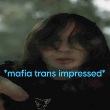 a picture of a girl with the words * mafia trans impressed * on the bottom