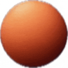 an orange ball on a white background with a shadow on it .