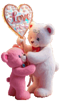 a white teddy bear is holding a heart shaped lollipop with the word love written on it