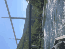 a bridge over a river with a blue sky