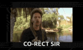 a man with dreadlocks is standing in front of a river and says `` co-rect sir '' .