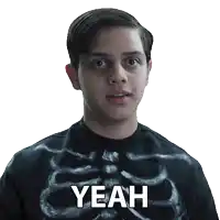 a young man wearing a black shirt with a skeleton on it says " yeah "