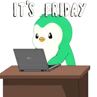 a green penguin is sitting at a desk using a dell laptop computer