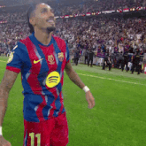 a soccer player wearing a jersey with the number 11 on it