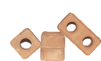 three bricks with holes in them are stacked on top of each other on a white background