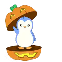 a penguin with a pumpkin on its head and the words happy halloween below it