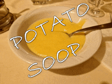 a bowl of potato soup with the words potato soup written on it