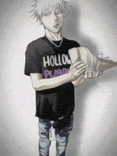 a man wearing a t-shirt that says hollo purp