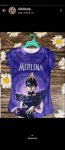 a purple shirt with the word merlina on the front