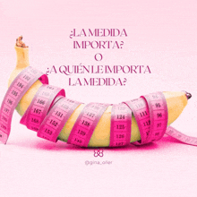 a banana is being measured with a pink tape measure