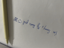 someone has written " i 'm sorry my barbie girl " on a white piece of paper