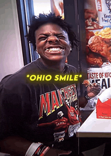 a man wearing a shirt that says ohio smile is smiling