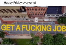 an aerial view of a street with the words get a fucking job written on it