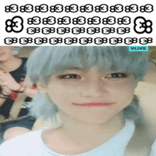 a girl with gray hair is smiling in a vlive video