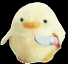 a stuffed yellow duck is holding a knife in its mouth .