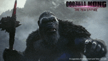 a poster for godzilla kong the new empire with a gorilla holding a sword