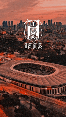 an aerial view of a stadium with the bjk 1903 logo