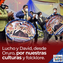 a group of men wearing face masks playing drums with the words lucho y david desde oruro on the bottom