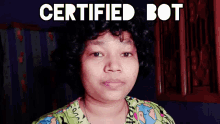 a woman with curly hair stands in front of a sign that reads certified bot