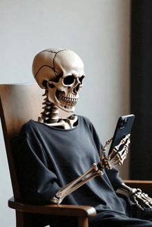 a skeleton is sitting in a chair holding a cellphone