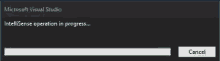 a microsoft visual studio window that says intellisense operation in progress and a cancel button