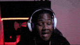 a blurry image of a person wearing headphones