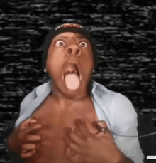 a man making a funny face with his mouth open