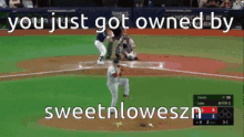 a picture of a baseball game with the words you just got owned by sweetnloweszn on the bottom