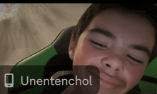 a picture of a boy with the word unentenchol on the bottom right