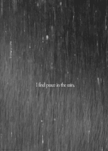 a black and white photo of rain with a quote that says i find peace in the rain