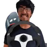a man with glasses is holding a steering wheel in front of his face