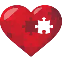 a red heart made up of puzzle pieces with a white puzzle piece in the middle