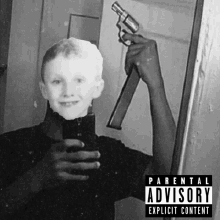 a picture of a boy holding a gun with parental advisory explicit content on the bottom