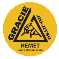 a yellow circle with a black triangle that says gracie jiu-jitsu hemet competition team