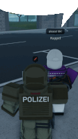 a person in a polizei uniform is talking to another person in a white hat