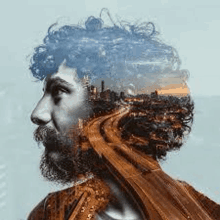 a double exposure portrait of a man with curly hair and a beard