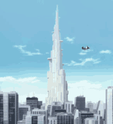 a very tall building in the middle of a city with a plane flying in the sky