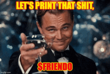 a man in a tuxedo is holding a glass of wine and says " let 's print that shit $friendo "