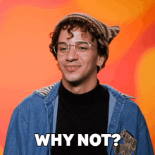 a young man wearing glasses and a beanie says why not