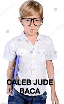 a young boy wearing glasses and holding a blue folder with caleb jude baca written on the bottom