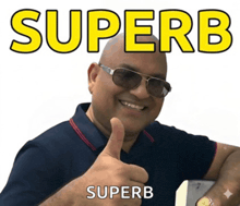a man wearing sunglasses giving a thumbs up in front of a superb sign
