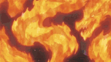 a close up of a fire with a lot of flames coming out of it