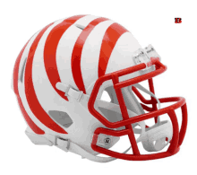 a white football helmet with red stripes and the letter b on the bottom