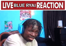 a man wearing blue headphones with the words live blue ryai reaction behind him