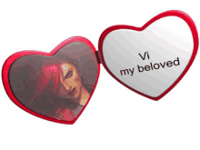 a heart shaped mirror with the words vi my beloved