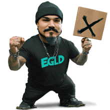 a man holding a sign that says egld