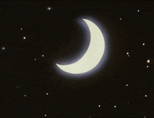 a crescent moon with a blue beam coming out of it in the night sky