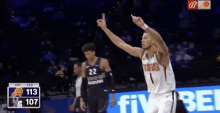 a basketball player with the number 1 on his jersey giving the middle finger