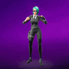 a woman in a suit and tie is dancing with her hands in the air .